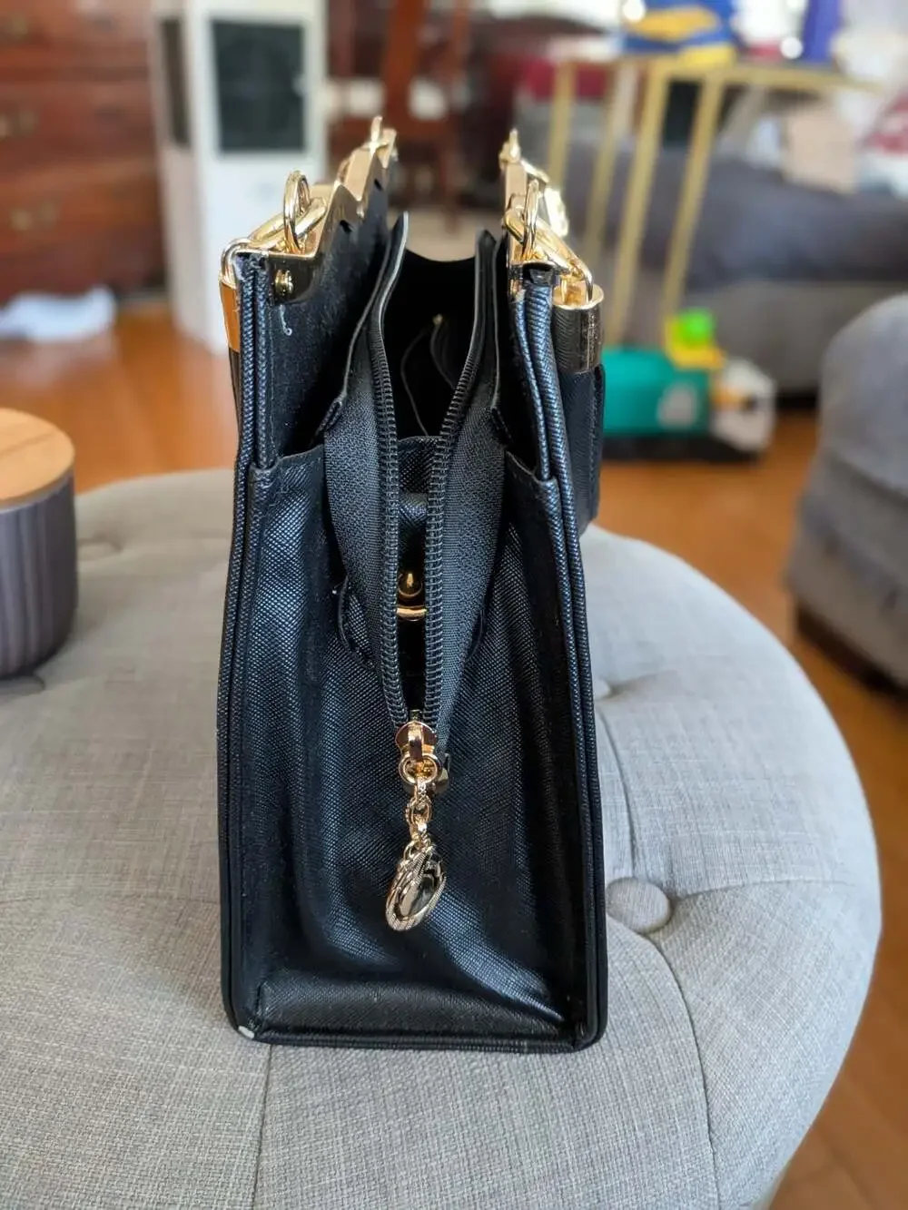 Black Saffiano Leather Handbag Satchel with Gold Bow Accent and Metal Trim